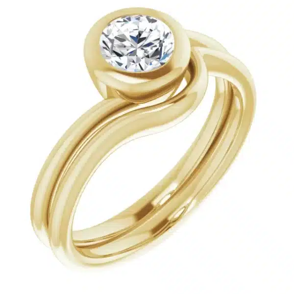 Bezel-set diamond engagement ring with wedding matching wedding band example