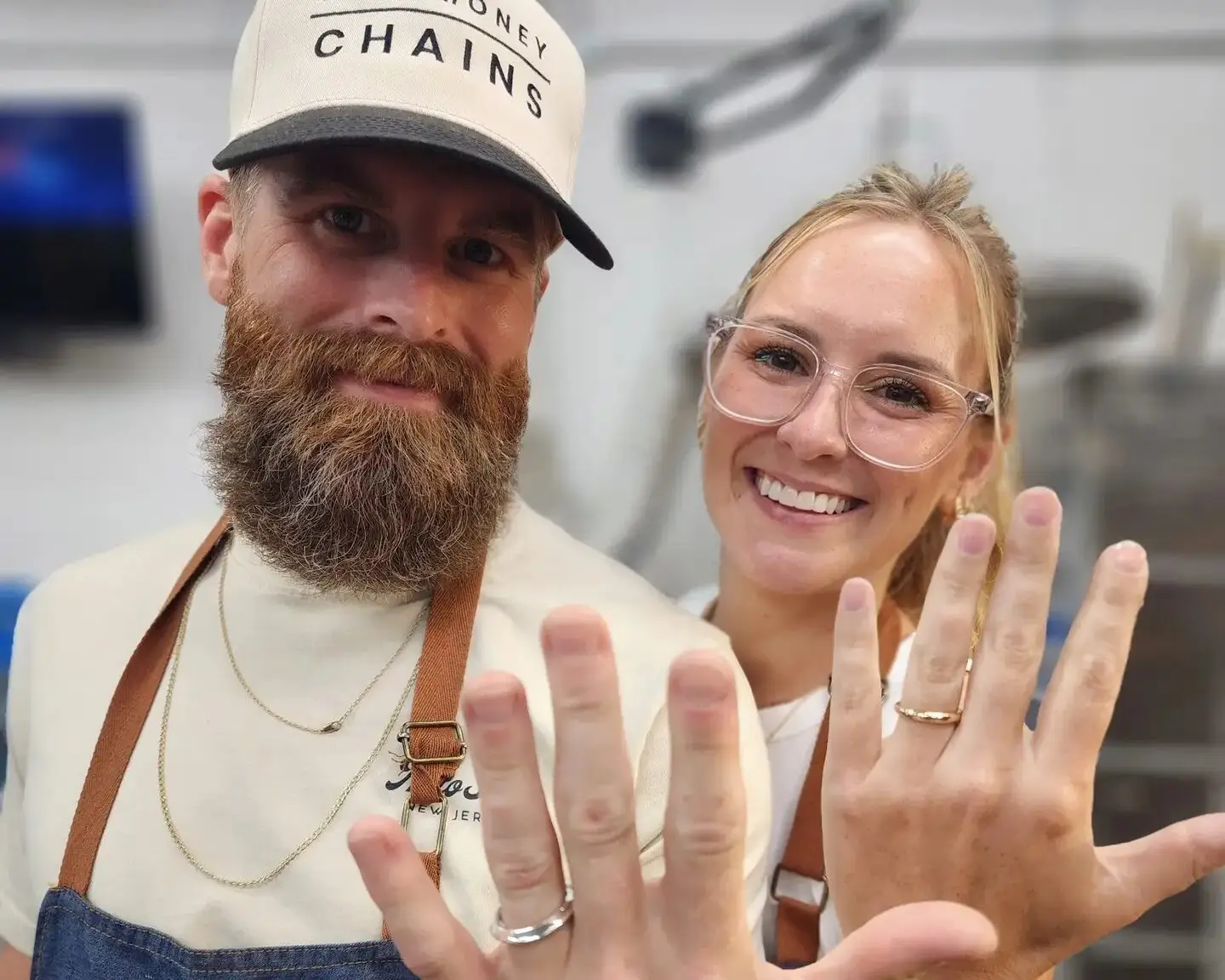 Couple with the wedding rings they made at LaProng wedding ring workshop