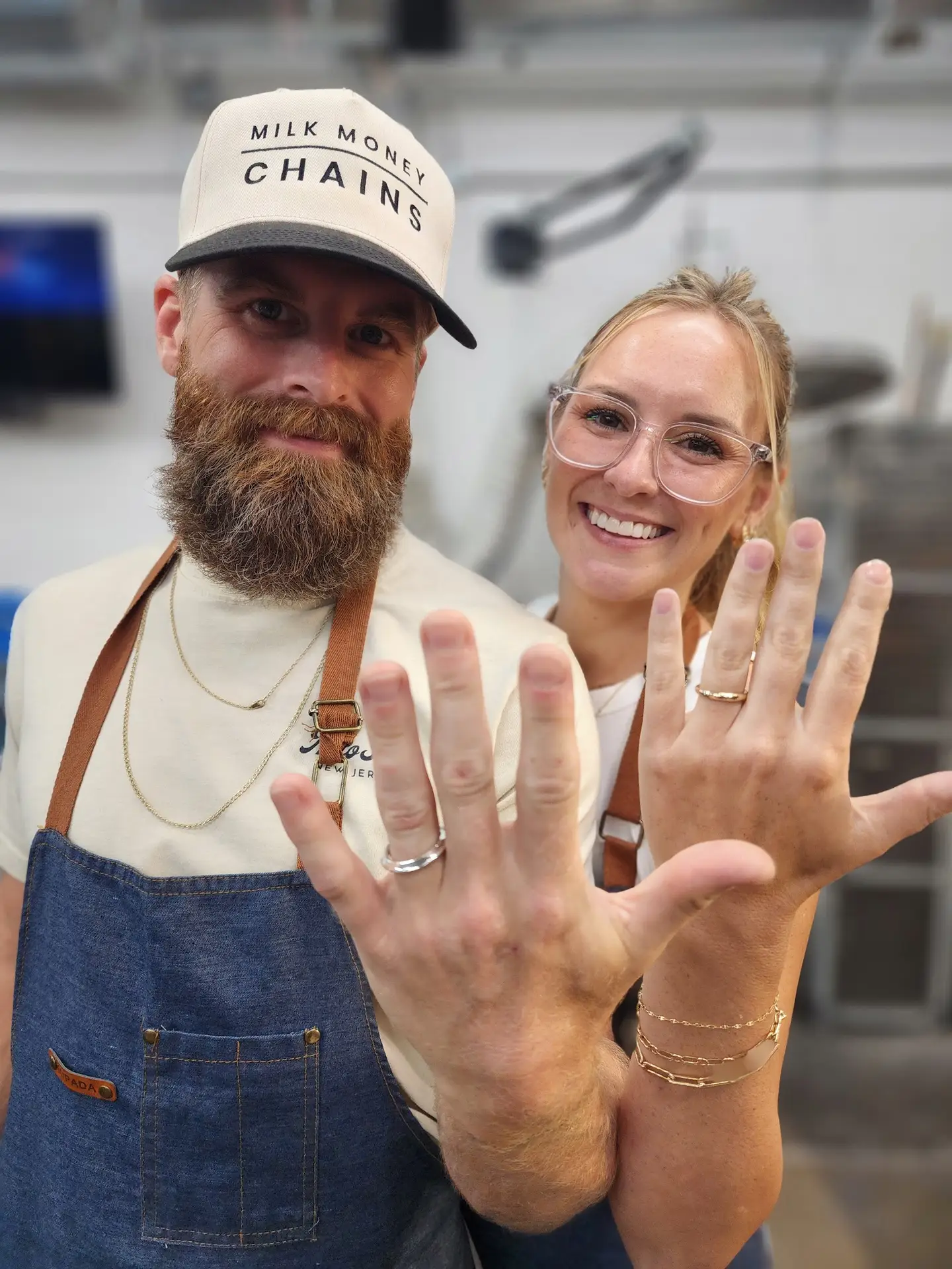 Happy couple showing the wedding rings they made at the LaProng make your own wedding ring workshop in Dallas