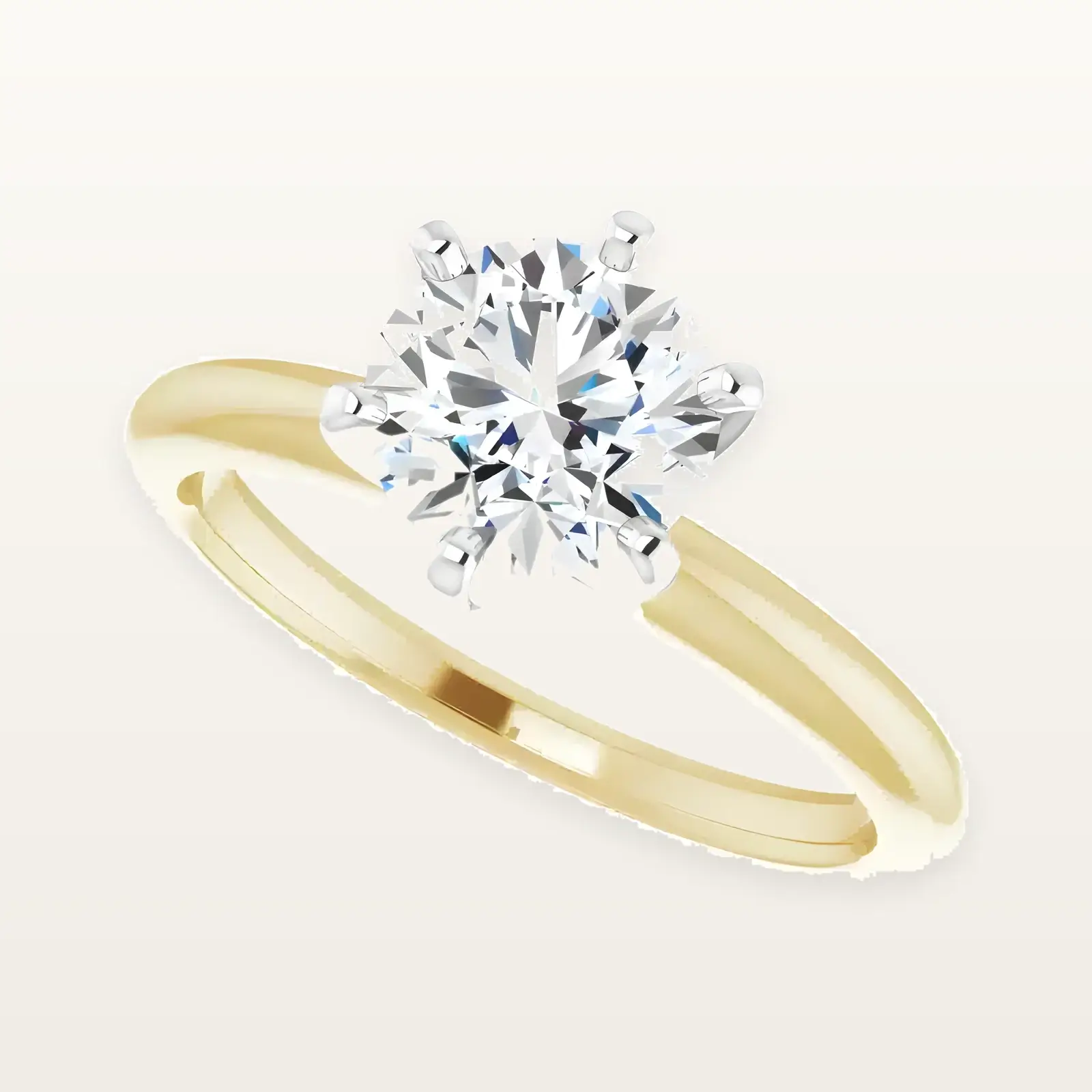 Handmade 14K gold solitaire engagement ring with a round moissanite center stone, made at the LaProng workshop in Dallas